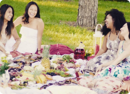 Group of four people on the grass